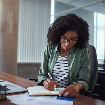 A woman creating search engine optimization company quality content