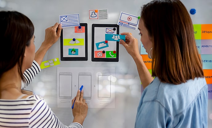 Two search engine optimization company in-house PPC experts at work